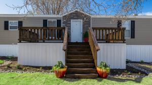 View of the exterior of a custom Stonegate manufactured home.