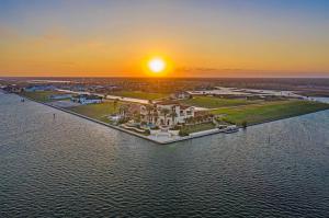 An aerial view from the Gulf of Mexico at twilight.
