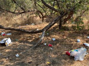 Trash litters the path at Alameda Creek.
