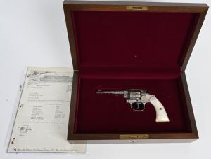 Antique 1897 Colt .32-caliber ‘New Police’ revolver with American-scroll engraving by Cuno Helfricht. Solid 99% gun with near-mint bore and action. Comes in modern Colt walnut fitted case. Estimate $7,000-$10,000