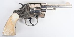 Antique Cuno Helfricht-engraved Colt Navy .41-caliber revolver, pearl stocks with carved steer head. Shipped in 1897. Estimate $8,000-$12,000