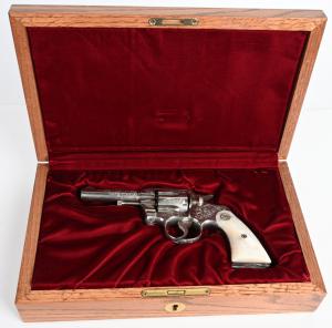 Colt .38-caliber Army Special revolver factory-engraved by William Gough (or his shop). Manufactured in 1924 and shipped to Walter G. Clarke Co., Omaha, Nebraska. Like-new bore and action. Modern Colt walnut display case. Estimate $8,000-$12,000