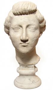 Lovely Roman marble head of a woman from the Julio-Claudian Period (circa early 1st Century BC), in the manner of the Empress Livia Drusilla (aka Julia Augusta). (est. $9,000-$12,000).