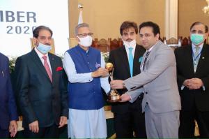 Jazib Zaman receiving Presidential Exports Trophy