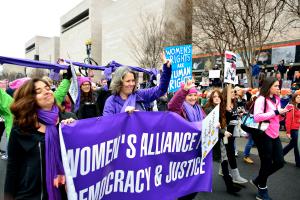 Dr. Jean Gearon leads the way during March in "Resisterhood."