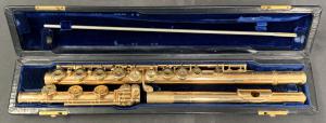 14kt gold handmade custom flute, engraved by the maker, “Verne Q. Powell, Boston”, dated to 1951 or 1952, serial #1299, with non-gold valves and original fitted leather case ($17,825).