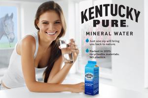 Woman drinking a glass of Kentucky Pure Mineral Water