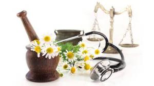 Natural health image with plant, stethoscope and scales