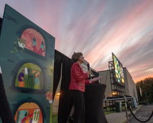 CDFF Festival Director Mary Ann Ponce speaks to the Opening Night drive-in crowd.