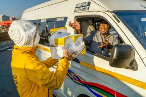 Serving 65 percent of the population daily, drivers of South Africa's minibus taxis received copies of booklet to hand to their passengers