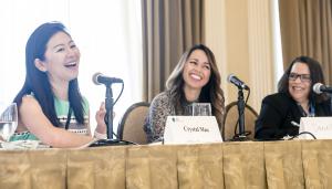 3 women speakers sitting at a table at the 2019 Conference on Women Leaders in Life Sciences Law. 