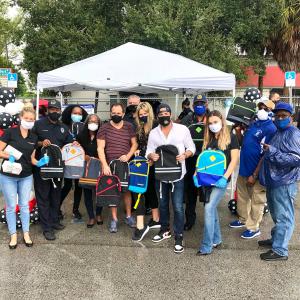 613MED in partnership with the Bal Harbour Police Department, donate masks, sanitizer, and uniforms to Poinciana Park Elementary School in Miami, FL.