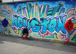 The BOHUP Crew in front of Houston graffiti