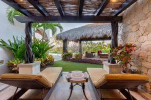 Private guest suites, featuring interior and exterior lounge areas.