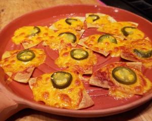 Nachos use the culinary layering technique for flavor that pops