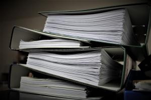 series of folders containing cyber security compliance paperwork