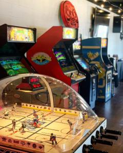 Play arcade games at the Nickel City local cigar lounge.