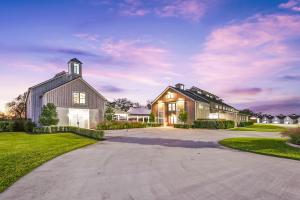 A multitude of indoor and outdoor spaces offer versatility for a variety of entertaining needs, not to mention four separate residences offer space for friends, family, and guests alike to relax in comfort.