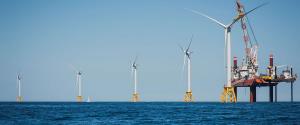 Photo of offshore wind turbines and jack-up rig