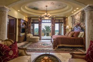 Retire to one of two master suites while guests enjoy space and privacy in one of two detached guest houses.