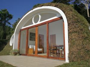 BIOTEKT House Covered in Vegetation