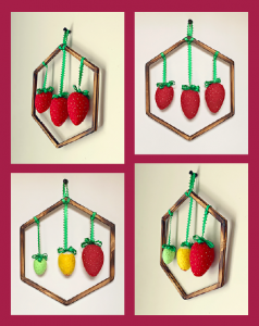 Handmade felt strawberries, framed with handcrafted wooden hexagons help these wallhangings bring whimsy and fun to small spaces.