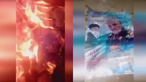 Jan 2021 Iran- Torching poster and banners of Qasem Soleimani, terminated commander of the notorious Qods Force