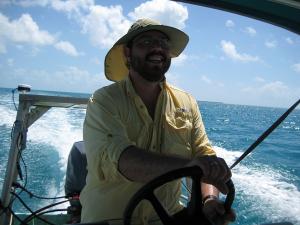 Dr. Pablo Granados-Dieseldorff on a boat in the field