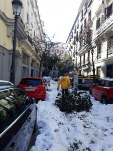 The narrow streets in the center of Madrid were blocked with snow, ice and fallen branches.