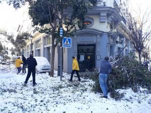 Volunteer Ministers began their disaster response at the National Church of Scientology in Madrid and moved on to shatter solid blocks of ice, shovel snow, and haul away branches throughout the district.