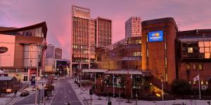 A cityscape of Cardiff's Motorpoint arena and the nearby streets