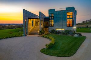 This state-of-the-art estate sits at the highest elevation in Little Compton, designed to soak in the incredible coastal countryside surrounding it.