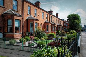 Redbrick terraced houses in the UK with front gardens