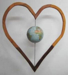 Sculpture of spinning globe inside a heart by Robert Markey of MA.