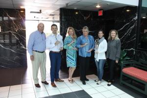 2020 Rick Kendrick Home Selling Team Award Winners. North Palm Beach Realtors, Chasewood Realty Real Estate Agency. In this photograph, from left, Rick Kendrick, the Awardees and Karey Kendrick (Broker, wife of Rick).