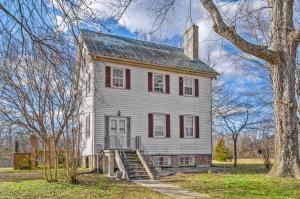 The county estate features 109.4± acres zoned A-1 with 2,190± ft. of road frontage, a 3 bedroom 2 bath 2,700± sq. ft. circa 1750 farm house (remodeled on 1985), several outbuilding and 8 acres of viable grapes and 26 acres of potential vineyard with trellis system