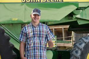 Photo of Cody Conrady on the farm