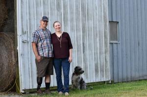 Photo of Cody and Bailey Conrady on the farm