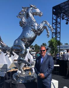 Mark Russo at Monterey Jet Center, California in front of ten foot tall stainless steel rearing stallion