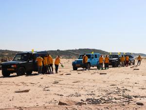 They traveled by 4X4 SUVs to reach this once-pristine, inaccessible stretch of beach 20 miles north of Tel Aviv.