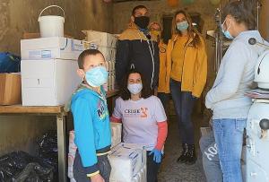 Scientology Volunteer Ministers and CEDEK carry out a joint project to donate supplies to a Roma baker who is providing a way out of poverty to marginalized children