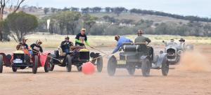 Ford Model T speedsters scramble to win the ball at the World Autopolo Championships