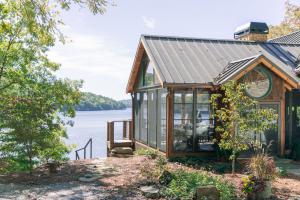 Cabin Porch with memory vinyl windows and door