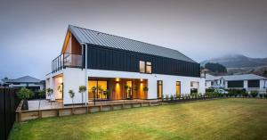 The tight building envelope of structural insulated panels contributes to energy savings in this net-zero energy home in New Zealand.