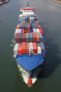 Ship carrying containers of commodities.