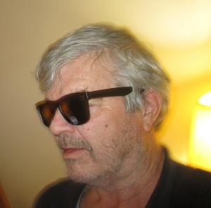 Headshot of Rocketball 007, singer-songwriter, producer and manager.