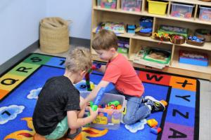 boys playing together in preschool classroom