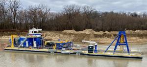 Side view of the Winter Bros new electric Chain-Ladder dredge designed and built by Custom Dredge Works