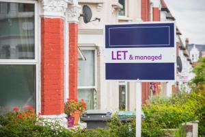 Let and managed sign displayed outside a terraced house in Harringay Ladder area, London