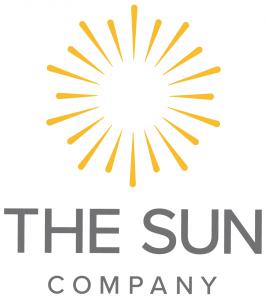 A yellow starburst illustration with The Sun Company written cleanly in Grey